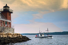 Fishing Trawler Passes Rockland Breakwater Light in Maine As